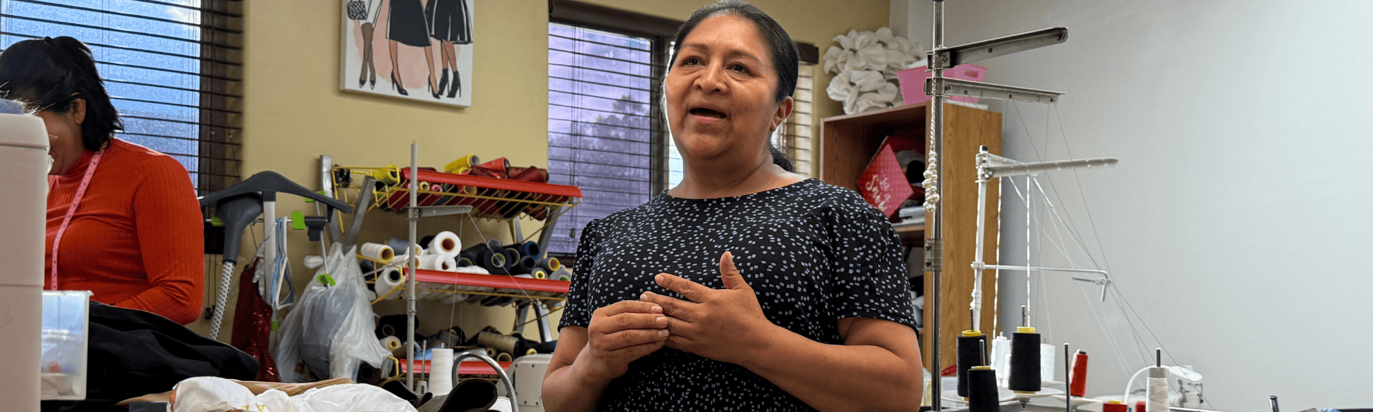 A 4th Street business owner shares her story during Welcoming Week 2025.