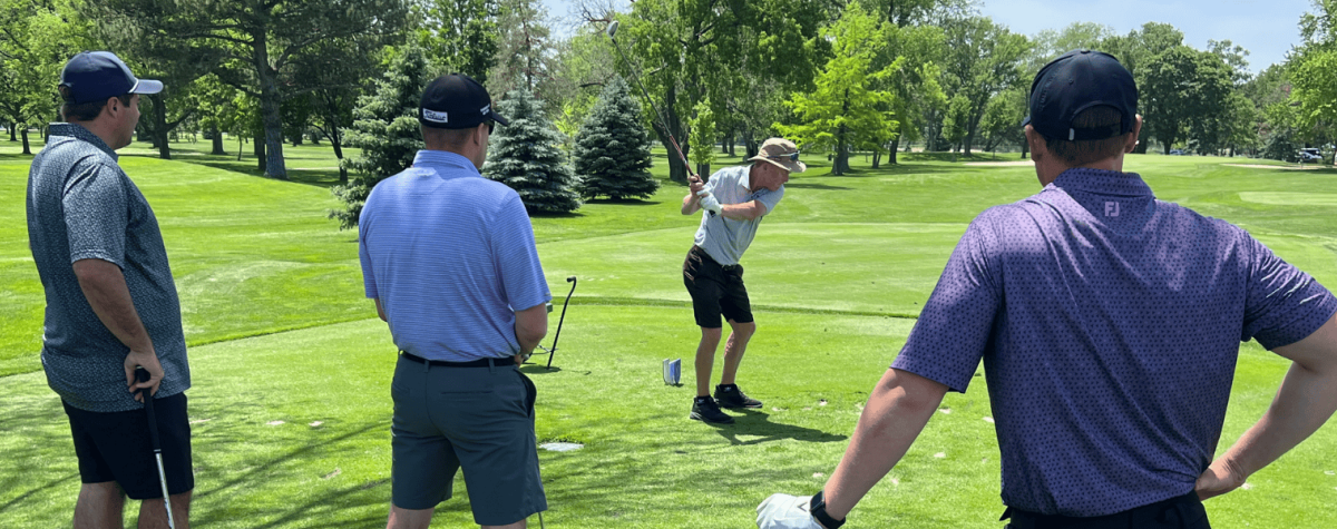 Golfers tee off during the Heartland United Way Golf Tournament in 2025.