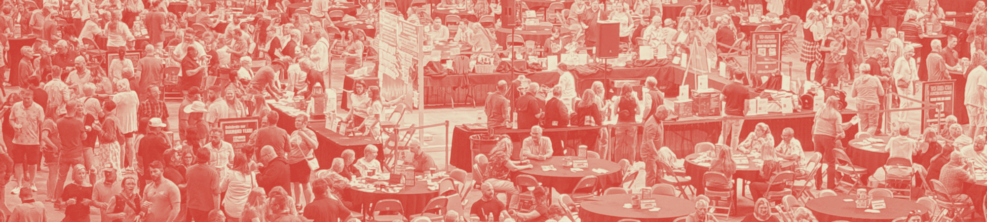 Crowd from Imagination Bacon 2025 in a red tint.