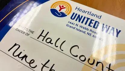 Heartland United Way's giant check is made out to Hall County.