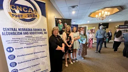 Heartland United Way community partners greet people at the 2025 Annual Meeting.